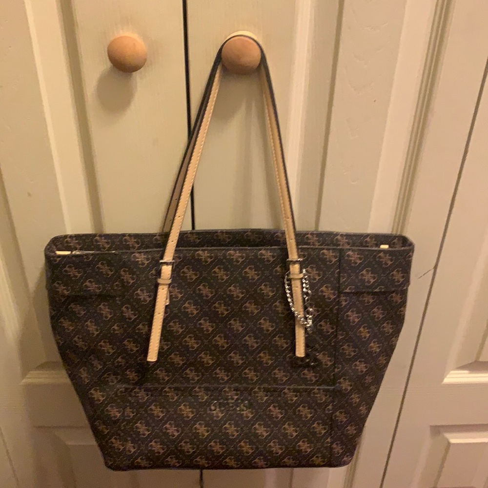 Guess bag. Bought at Buckle. Very clean in smoke free home.